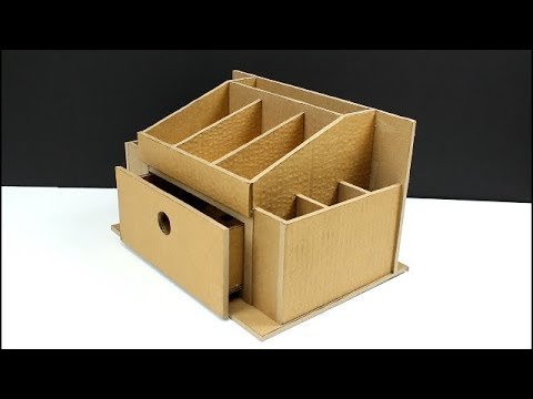 Organización creativa y funcional: Construye un organizador de escritorio con cajas de cartón forradas en papel estampado